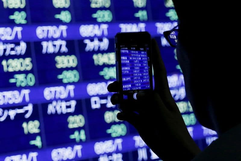 Oil jumps and stock futures slip on renewed US-Iran fighting